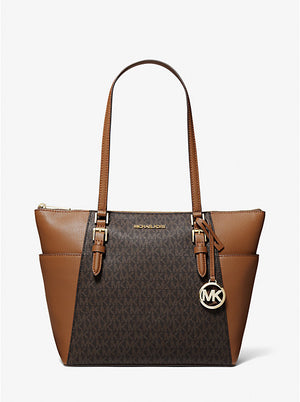 How much is a michael kors purse hotsell